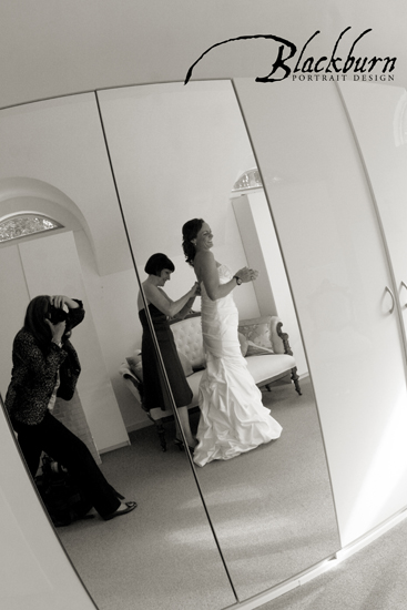 Saratoga Springs Wedding Photographer Bride getting dressed at a private residence in Saratoga NY