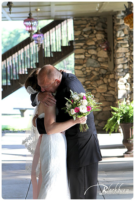 candid wedding photo crooked lake house